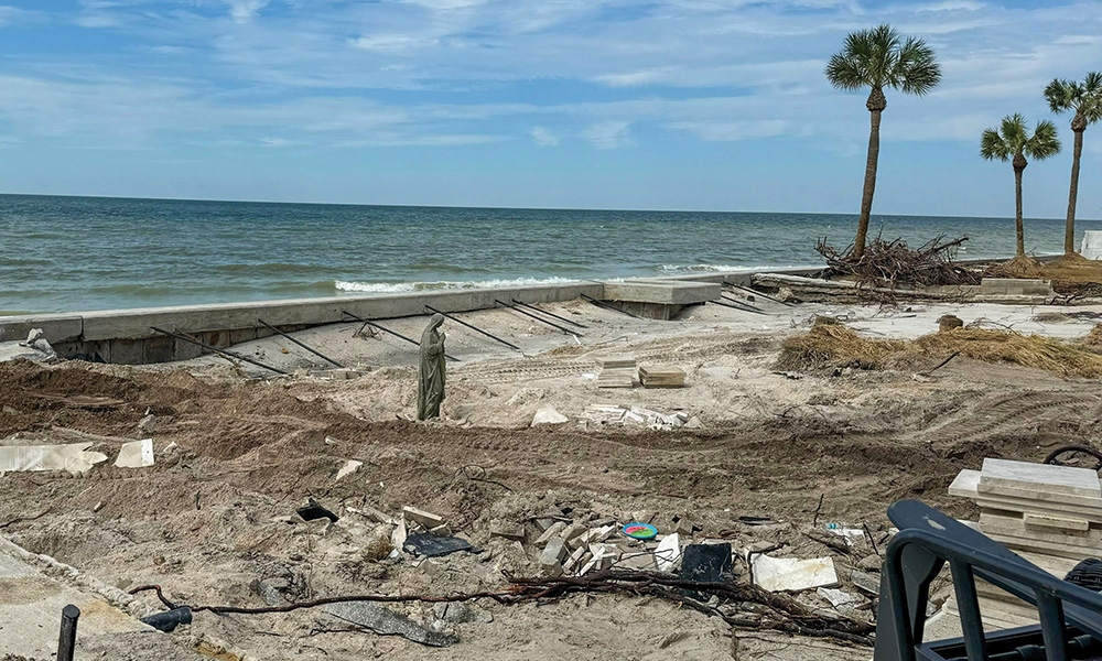 Concrete statue of the Virgin Mary in Sheila and Mike Tolbert's backyard on the beach